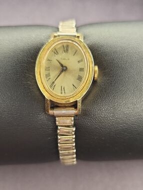 Timex Women's Gold Tone Oval Dress Watch with Expansion Bracelet